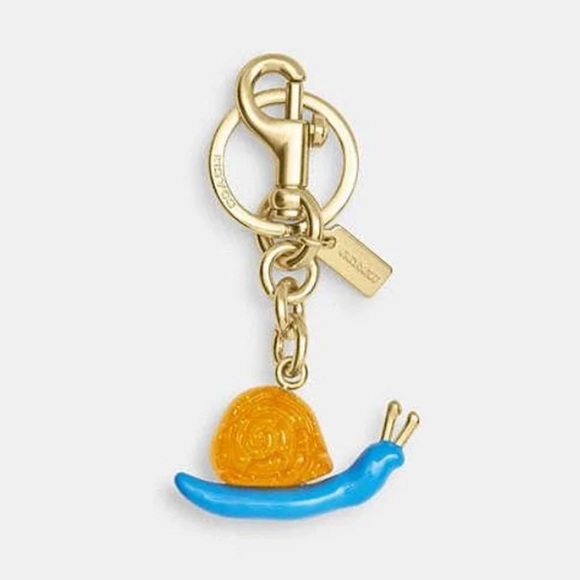 Coach Accessories - NWT Coach X Observed By Us Snail Bag Charm without a dust bag Blue Yellow CU307